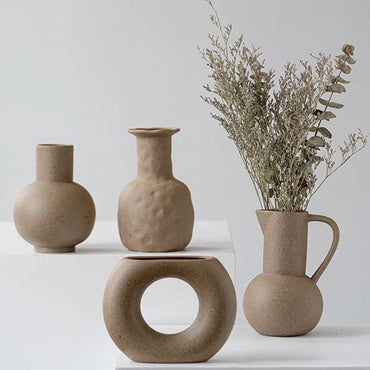 Koroa ceramic vases with clay pottery texture in various sizes, holding fresh and dried flowers