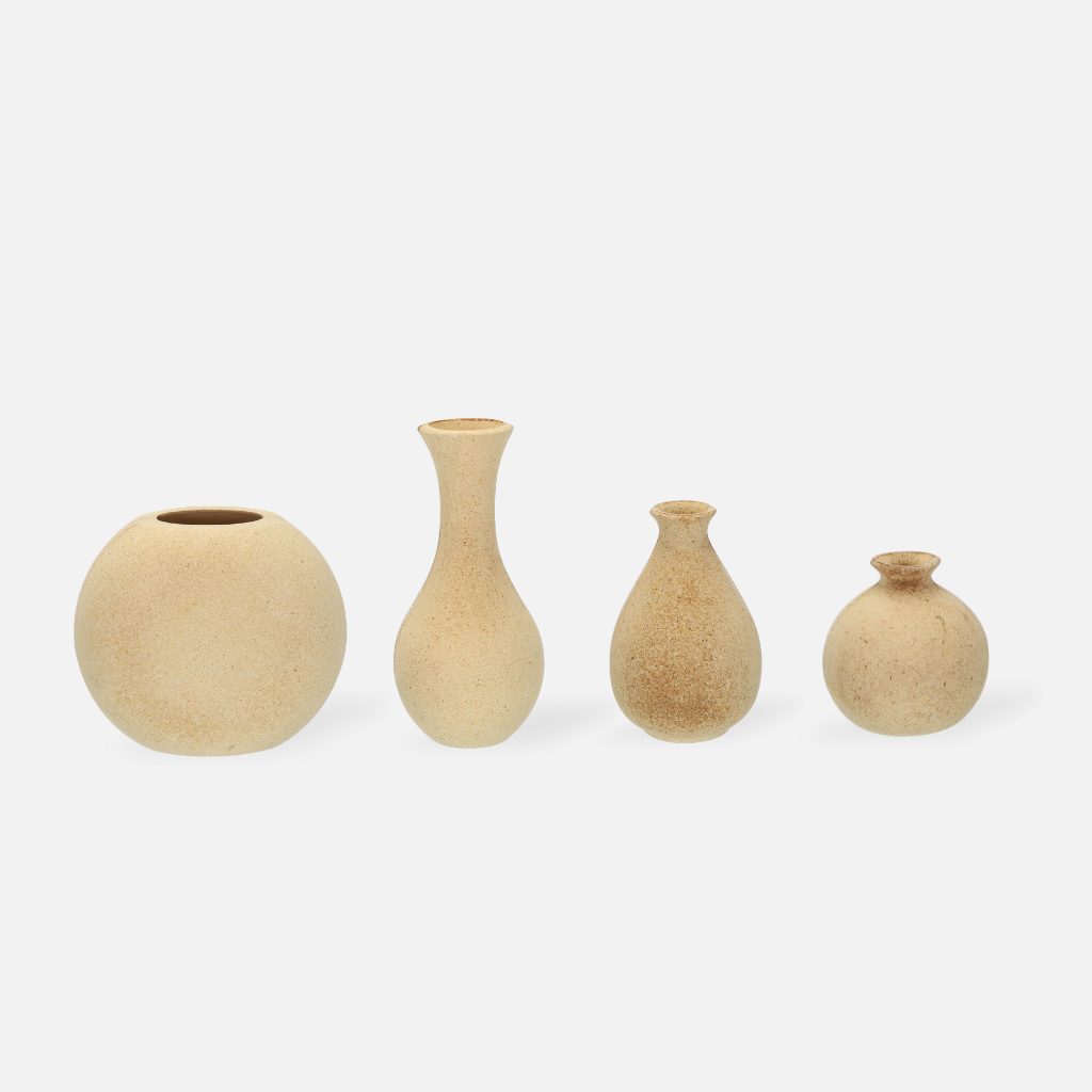 Solora wooden vases in multiple sizes with natural dark spots