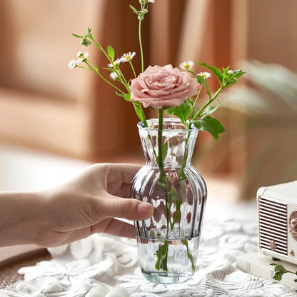 Modern clear glass vases set with small mixed flower bouquet